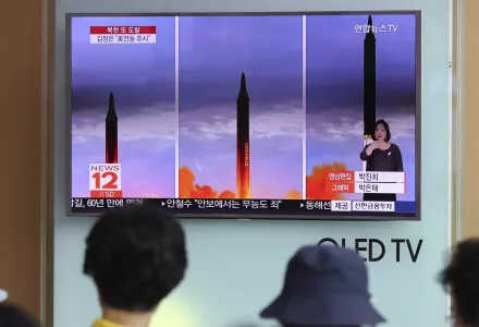 People at Seoul Train Station watch a a local news program reporting about a North Korean missile launch. Aug. 30, 2017 (Lee Jin-man/Associated Press).