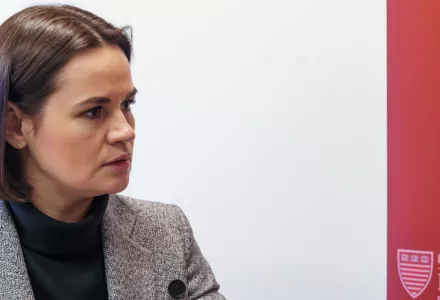 Q&A with Sviatlana Tsikhanouskaya at left with a crimson Belfer Center banner at right