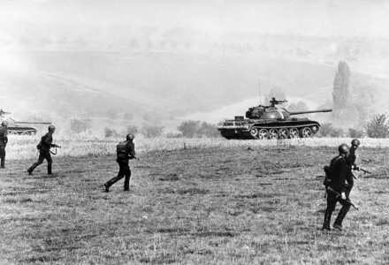 Military exercise 'October Storm': Soviet soldiers march forward protected by T-54 tanks on the second day of the exercise of the Warsaw Pact member Staates, October 22, 1965 simulating an attack in the Thuringian Forest in the German Democratic Republic (East Germany).