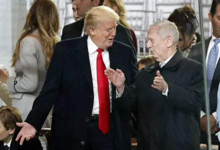 President Donald Trump, left, talks to Defense Secretary James Mattis 