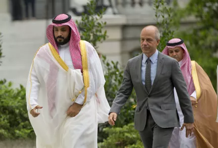 Saudi Arabia's Deputy Crown Prince Mohammed bin Salman, left, walks into the West Wing of the White House in Washington escorted by Deputy Chief of Protocol Mark E. Walsh, right, Friday, June 17, 2016.