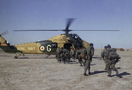 British troops board a helicopter