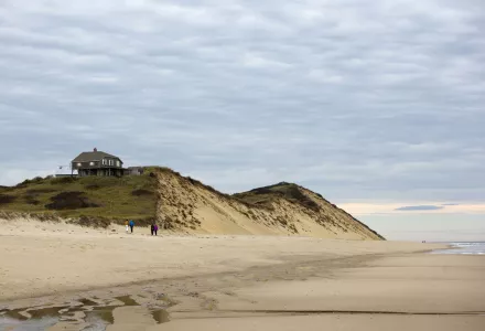 erosion of a dune in front of a house 