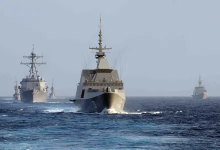 The Singapore Navy frigate RSS Supreme (FFG 73), center, leads the guided missile destroyer USS Chung-Hoon (DDG 93), left, and the Singapore Navy corvette RSS Vigour (92) during maneuvers 