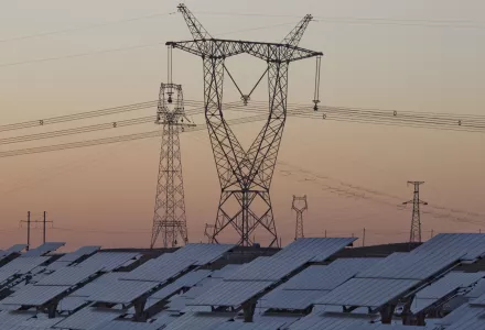 solar panels are seen near the power grid in northwestern China