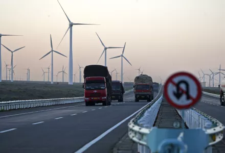 Windmills operate at the Da Bancheng Wind Farm, Xinjiang, China