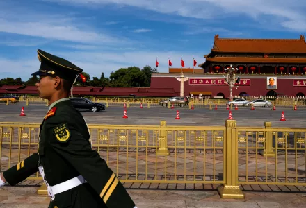 A Chinese soldier stands guard next to Tiananmen Square