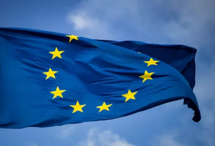 Flag of the European Union against a blue sky
