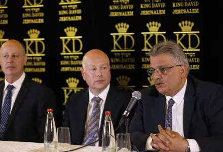 U.S. President Donald Trump's Middle East envoy, Jason Greenblatt, center, Israeli Minister of Regional Cooperation Tzachi Hanegbi, left, and the head of the Palestinian Water Authority, Mazen Ghoneim, give a news conference about a water-sharing agreement in Jerusalem