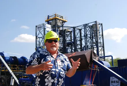 Stan Osserman, director of the Hawaii Center for Advanced Transportation Technologies, speaks in front of a new waste to energy facility at Joint Base Pearl Harbor-Hickam, Hawaii. 