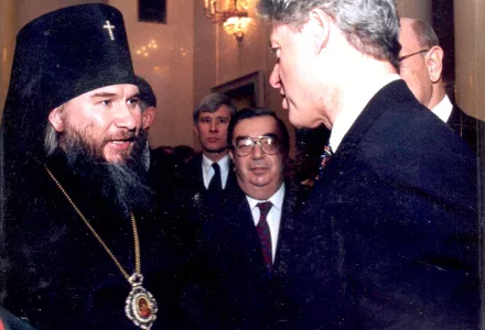 1994—Moscow’s Spaso House: Rolf Mowatt-Larssen (back center), then a declared CIA Representative to Russian Intelligence Services in Moscow, stands behind Yevgeniy Primakov, Director of the Russian External Intelligence Services (SVRR), with President Bill Clinton and a senior Russian Orthodox Church official at the U.S. Ambassador’s residence.