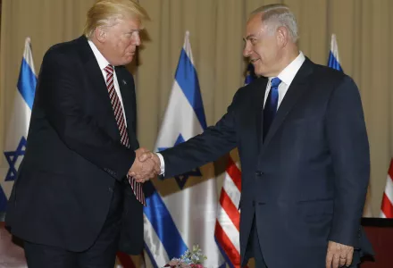 Israel's Prime Minister Benjamin Netanyahu, right and U.S. President Donald Trump shake hands