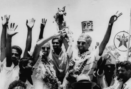 Dr. Cheddi Jagan, right, celebrates with his U.S. born wife, Janet, left