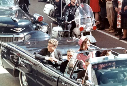 President Kennedy in the limousine in Dallas, Texas, on Main Street, minutes before the assassination