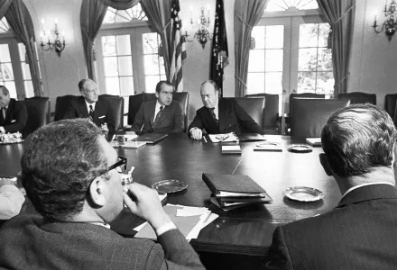Dr. Henry Kissinger, foreground, at a White House strategy session. Pictured from the left are: Secretary of State William P. Rogers. U.S. President Richard Nixon, and Defense Secretary Melvin R. Laird.