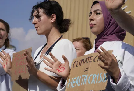 Demonstrators advocate for the 1.5 degree warming goal to survive at the COP27 U.N. Climate Summit, Wednesday, Nov. 16, 2022, in Sharm el-Sheikh, Egypt.