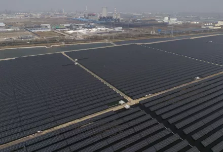 A large solar farm next to a chemical plant in Weifang, Shandong, China.