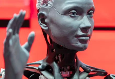 A robot with hand raised 