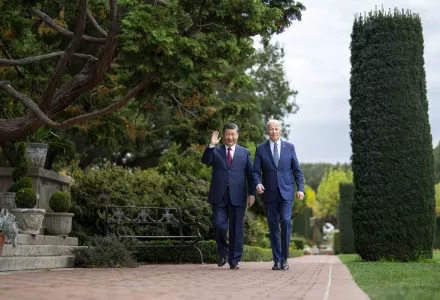 President Joe Biden and China's President President Xi Jinping walk in the gardens