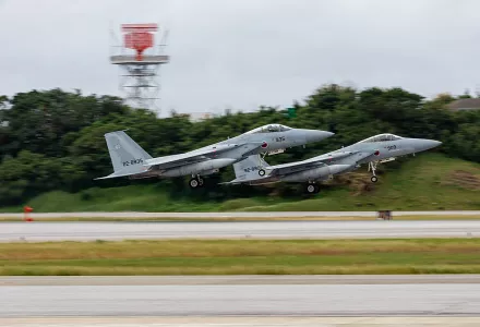 Mitsubishi F-15Js taking off at the Naha Air Show in 2018.