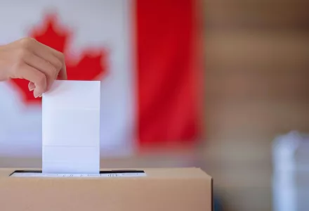 A Canadian casts a vote