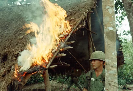  SGT Richard McConchie watches a fire he started