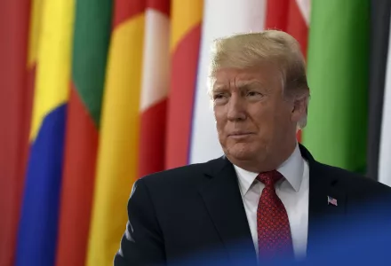 President Donald Trump walks on stage to speak at the Global Coalition to Defeat ISIS meeting at the State Department in Washington, Wednesday, Feb. 6, 2019.