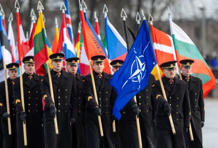 Lithuania's military officers march with flags of many nations during a military parade ceremony marking the 106th anniversary of the Lithuanian military, on Armed Forces Day, in Vilnius, Lithuania, Saturday, Nov. 23, 2024.