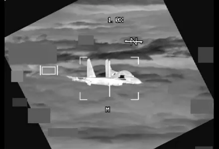 In this image made from video provided by U.S. Indo-Pacific Command, a People's Republic of China J-11 is seen from a U.S. Air Force B-52 aircraft, over the South China Sea on Oct. 24, 2023.