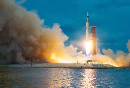 Rocket takes off into the sky. Lots of smoke and gas. The elements of this image furnished by NASA.
