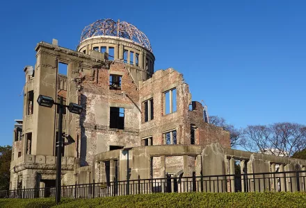 Genbaku, the Atomic Bomb Dome, is a UNESCO World Heritage Site in Hiroshima, Japan that stands as a striking reminder of the horrors of the atomic bombings.