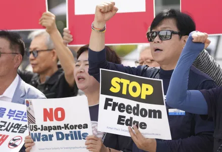 Protesters shout slogans during a press conference to oppose the military exercise called Freedom Edge in Seoul, South Korea, Monday, Sept. 15, 2025.