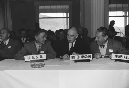 Delegates M.S. Stepanov of Russia, Lord John Maynard Keynes and Vladimir Rybar of Yugoslavia confer during the Monetary Conference at Bretton Woods, N.H. in July 1944