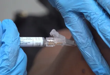 A pharmacist gives a patient a flu shot in Miami on Sept. 9, 2025. (AP Photo/Daniel Kozin)