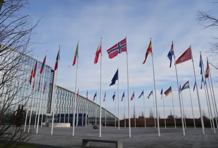 Flags flap in the wind outside NATO headquarters in Brussels, Monday, Jan. 19, 2026. (AP Photo/Virginia Mayo)