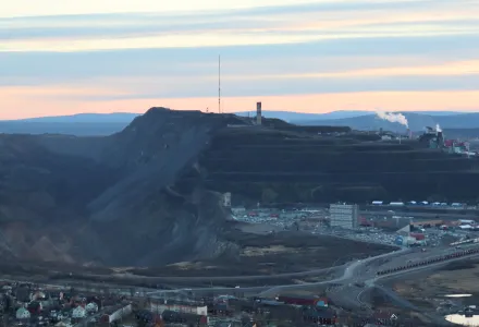 Kirunavaara and Kiruna Iron Mine in Kiruna (Sweden) as seen from Luossavaara at sunset in 2022.