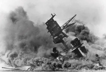 In this Dec. 7, 1941 file photo, smoke rises from the battleship USS Arizona as it sinks during the Japanese attack on Pearl Harbor, Hawaii.