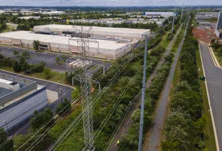 High-voltage transmission lines provide electricity to data centers in Ashburn in Loudon County, Virginia, on Sunday, July 16, 2023.