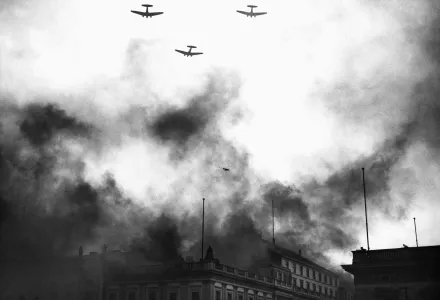 Squadron of bombers flying over the political center of Berlin, Wilhelmstrasse, Sept. 20, 1937, in a sham attack on the capital. 