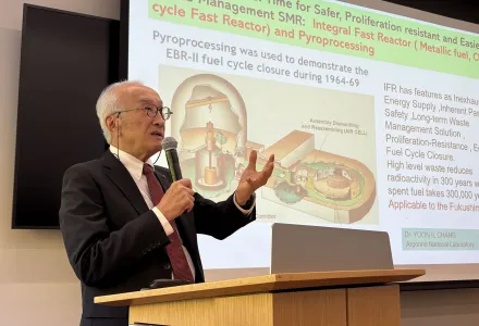 Nobuo Tanaka presents at a podium during a talk at Harvard Kennedy School on October 19, 2026.