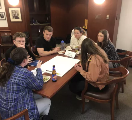 Harvard Kennedy School community members hold a group discussion about extractive industries in the Arctic and Africa.