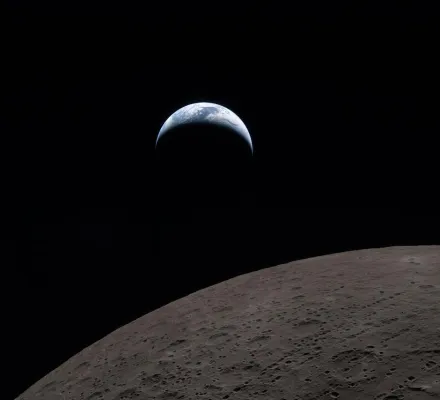 Picture of the earth behind the moon