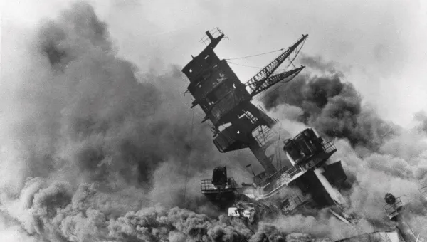 In this Dec. 7, 1941 file photo, smoke rises from the battleship USS Arizona as it sinks during the Japanese attack on Pearl Harbor, Hawaii.