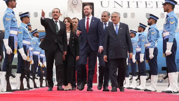 U.S. Vice President JD Vance, center, walks with Pakistan's Chief of Defence Forces and Chief of Army Staff Field Marshall Asim Munir, left, and Pakistani Deputy Prime Minister and Foreign Minister Mohammad Ishaq Dar after arriving for talks with Iranian officials in Islamabad, Pakistan, Saturday, April 11, 2026. (AP Photo/Jacquelyn Martin, Pool)