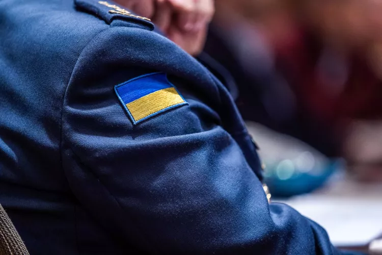 The flag of Ukraine on the uniform of Col. Hennadiy Kovalenko, staff officer, NATO Supreme Allied Commander Transformation HQ, in December 2019.