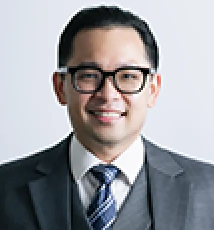 Headshot of Evan Laksmana 