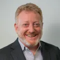 Headshot of Mark Brownstein.